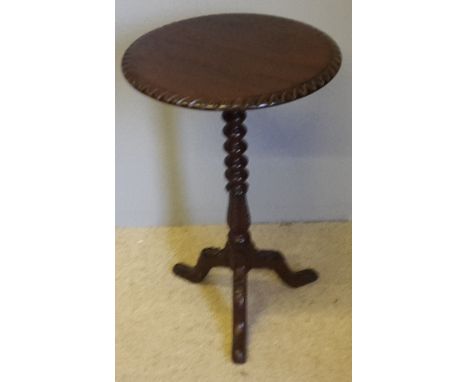 A Victorian mahogany tripod table