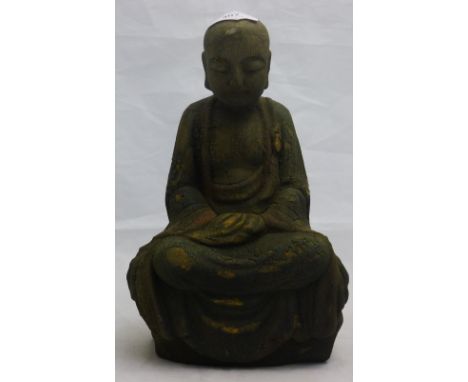 A Chinese carved wooden model of Buddha