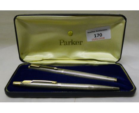 A 1970s sterling silver Parker fountain pen with 14 K nib and an associated sterling silver ballpoint pen