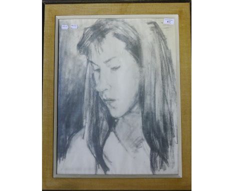 A charcoal portrait of a girl
