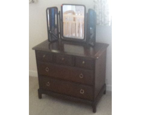 A Stag chest of drawers, a Victorian stick back armchair, a mirror, three raffia topped stools, a piano stool, sewing box, fi