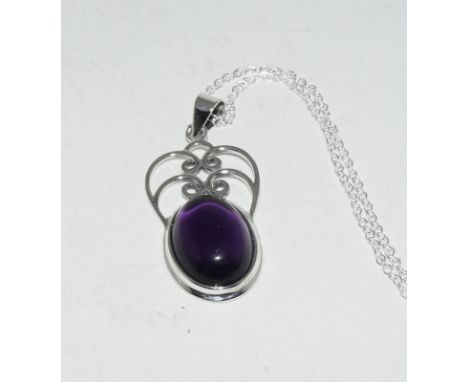 A silver & amethyst Art Nouveau style pendant necklace on silver chain