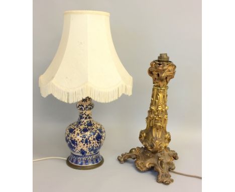 Brass table lamp together with a china based lamp