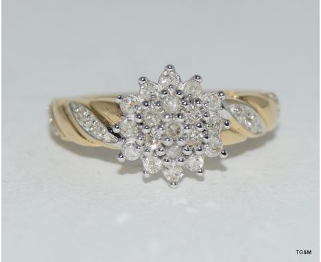 9ct gold diamond cluster ring. Size k