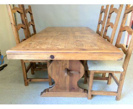 4 ladder back chairs and a pine stained refectory table. 90 x 200 x 100cm