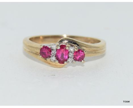 9ct gold ladies diamond and ruby ring size P