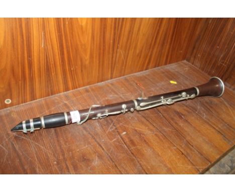 A VINTAGE CLARINET BY HAWKES AND SON OF LONDON