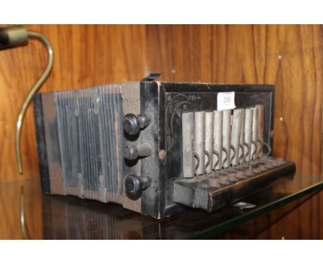A BLACK VINTAGE ACCORDIAN 