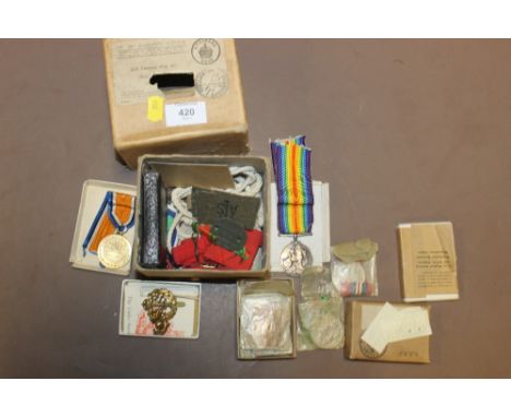 A BOX OF WAR RELATED EPHEMERA AND MEDALS TO INCLUDE FIRST AND SECOND WORLD WAR MEDALS ETC.