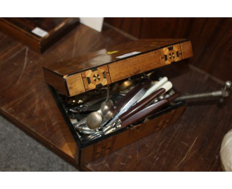 AN INLAID TRINKET BOX CONTAINING ASSORTED FLATWARE TO INCLUDE SILVER PLATED EXAMPLES