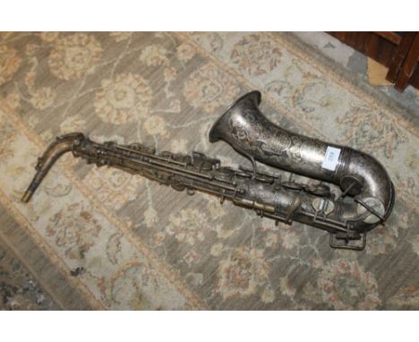 A VINTAGE SAXOPHONE BY HAWKES AND SON OF LONDON