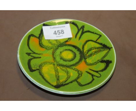 A SMALL GREEN POOLE POTTERY PIN DISH 