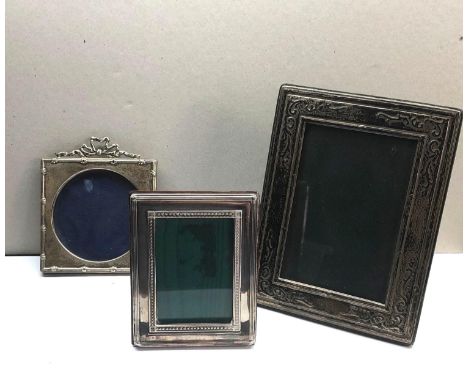 3 Vintage silver picture frames largest measures approx. 18cm by 14cm 