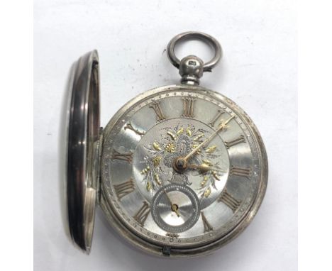 Antique silver dial fusee pocket watch Tho Gilson Pocklington watch winds and ticks ornate silver dial with floral decoration