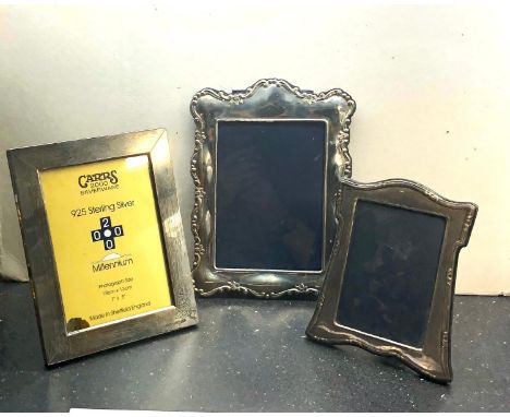 3 Silver picture frames largest measures approx 26.5cm by 19.5cm 