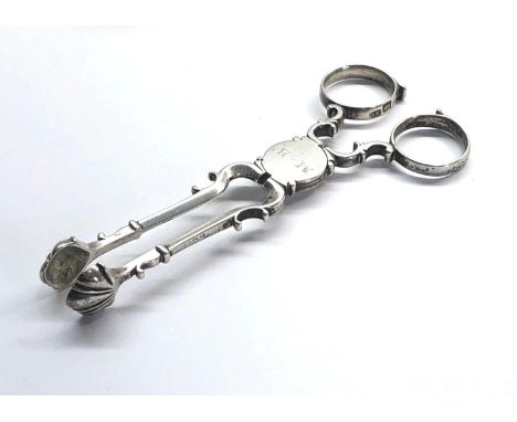 Antique Georgian Silver scissor sugar nips silver hallmarked maker AO measures approx. 12cm long 