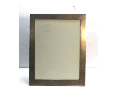 Large vintage silver picture frame hallmarked silver  H.C Ltd measures approx 24cm by 19cm in good condition 