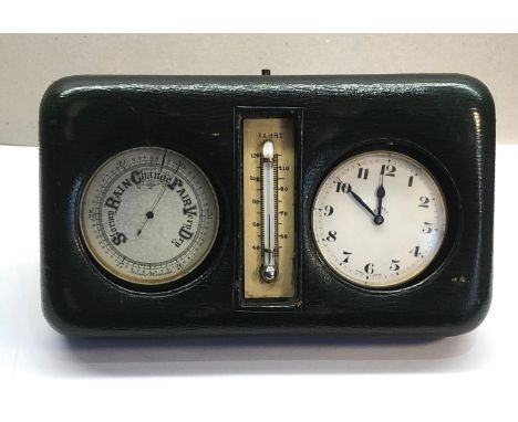 Cased goliath 8 day pocket watch and combined barometer case has fitted thermometer watch winds and ticks green leather casin