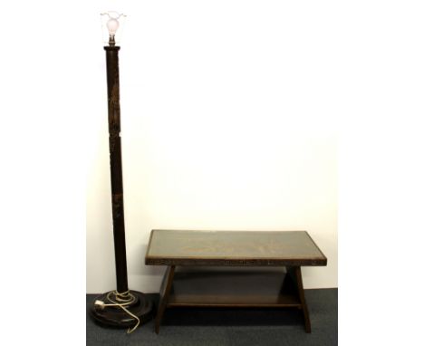 A mid 20th century oriental carved wooden standard lamp together with a glass topped carved dark wood coffee table, table 40 