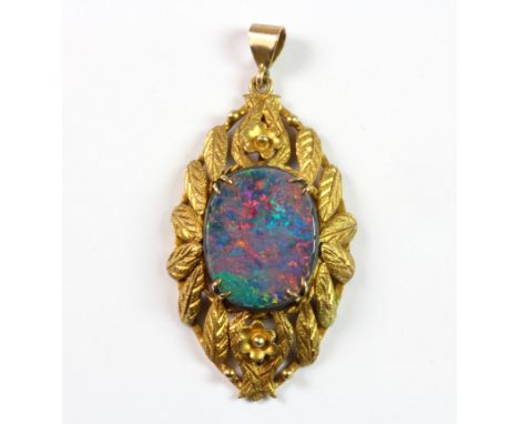 A 9ct yellow gold (stamped 9ct) opal doublet set pendant, L. 4cm.