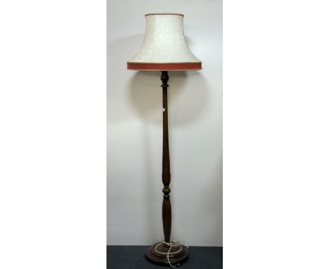 A vintage standard lamp and shade.