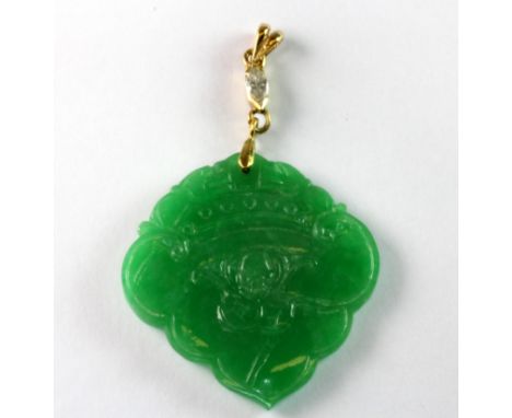 A beautiful yellow metal (tested minimum 9ct gold) mounted Chinese carved jade pendant set with a marquise cut diamond on the