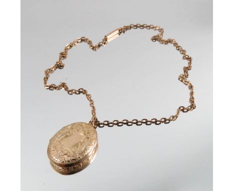 A 9 carat gold oval locket, on a chain, 7.4g gross