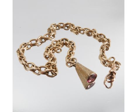 A watch chain, with indistinct mark, 44cm long, 40g gross, with a seal attached