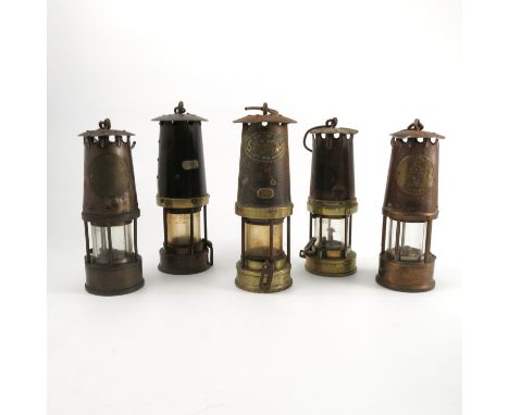Two type SL Protector Lamp and Light Company miners lamps, together with a John Davis & Son Derby miners lamp number 313, and