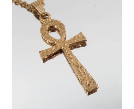 A 9 carat gold Ankh pendant, 3.7g gross, on an 18 carat gold chain, 8.2g gross, 62cm long