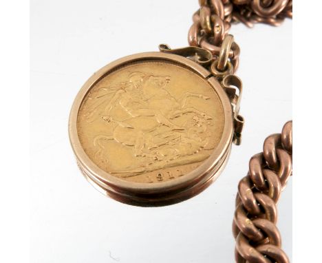 A 1910 gold sovereign, in a 9ct gold mount, together with a 9ct gold curb link chain and T bar, total weight 49.2g