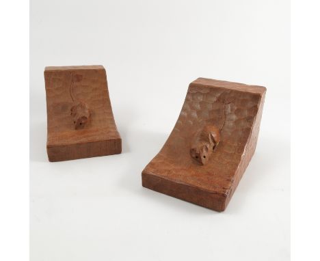 A pair of Robert Thompson of Kilburn (Mouseman) adzed oak book ends, height 6.25ins