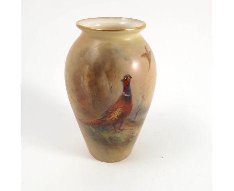 A Royal Worcester blush ivory vase, decorated with a cock pheasant in landscape and another pheasant in flight by Jas Stinton