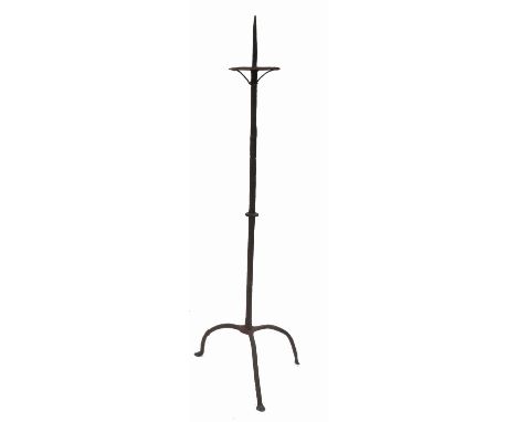 A similar antique iron pricket candle stand, the octagonal column raised on a tripod base, height 50ins