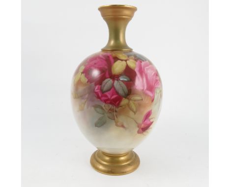 A Royal Worcester vase, decorated with roses front and back, with gilded neck and pedestal foot, shape number 1846, dated 191