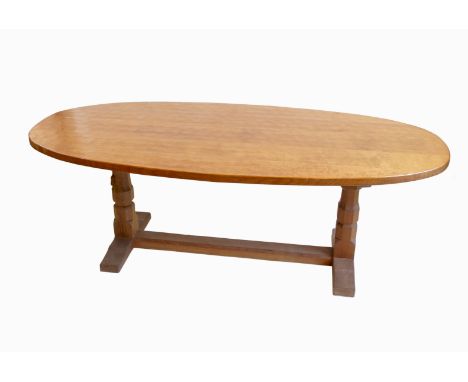 Robert Thompson of Kilburn (Mouseman), dining table, the oval adzed top raised on an octagonal column with sledge feet united