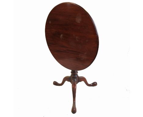 A late Georgian mahogany circular occasional table, raised on a tripod base with birdcage movement, width 29.5ins