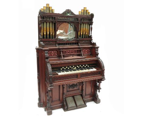 A 19th century mahogany cased pedal organ, made by Clough & Warren and bearing an Elgar & Co, Worcester, label, having a supa