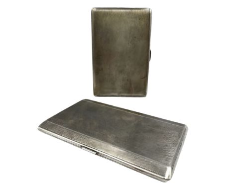 Engine turned silver cigarette case, the interior with inscription Birmingham 1938, and another Birmingham 1940 13oz