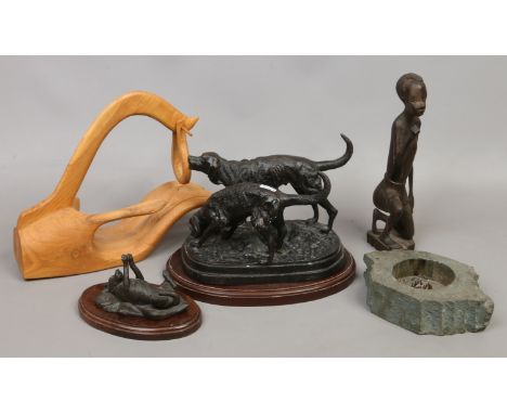 A collection of decorative items to include bronze figure of labradors, carved African figure, wood wine bottle holder/pourer