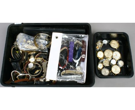 A box of assorted manual and quartz wristwatches including vintage examples.