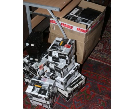 A box of new and unused light fittings an associated controllers by United Light UK.