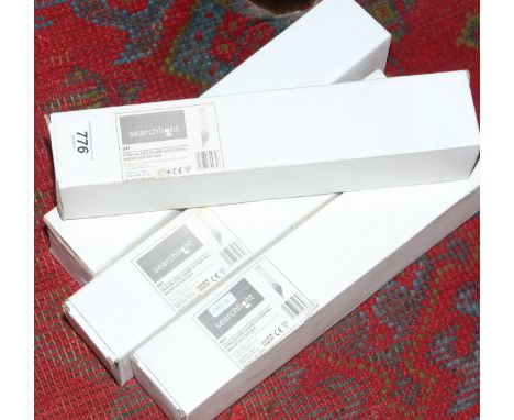 A set of four stainless steel outdoor square formed bracket light fittings.