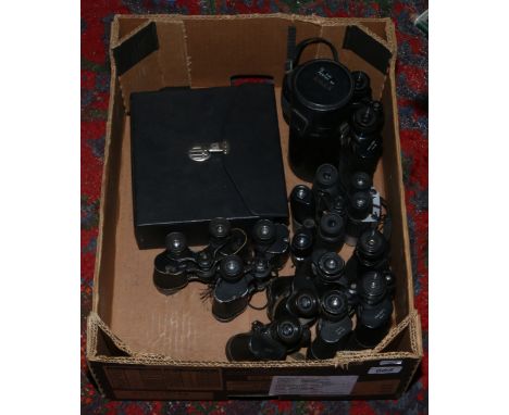 A box of mostly vintage binoculars including Kylos, Lieberman and Gortz examples along with two camera lenses. 