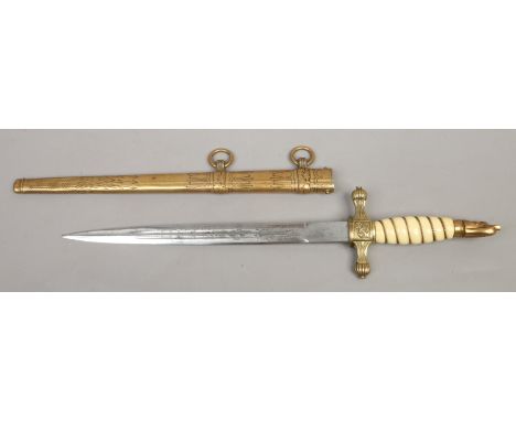 A Kriegsmarine pattern dagger in metal scabbard.