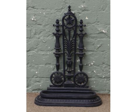 A cast iron stick stand.