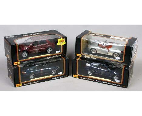 Four boxed Maisto special edition 1/18 scale Diecast metal model cars including Mercedes-Benz and Porsche.