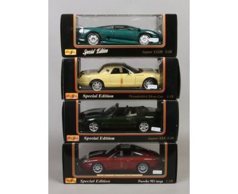 Four boxed Maisto special edition 1/18 scale Diecast metal cars including Jaguar, Thurderbird and Porsche.