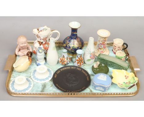 A good tray of collectable ceramics including Carltonware, Wedgwood, Royal Doulton miniature character jug, Wade, Crown Devon