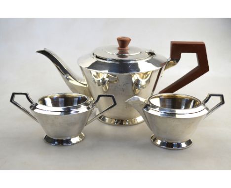 An Art Deco silver three-piece tea service of conical form, Barker Bros. Silver Ltd., Birmingham 1938, 29.4 oz gross